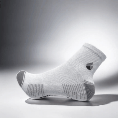 White and grey ankle running socks with moisture-wicking and breathable mesh panels