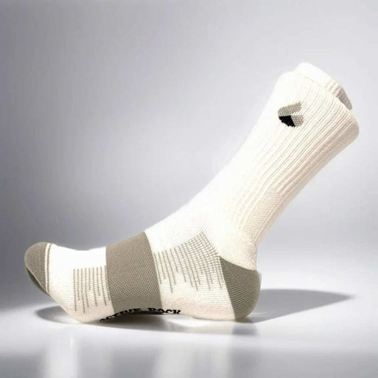 White and grey crew tennis socks with Active Arc compression and seamless toe design.